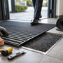 Installer un tapis encastré d’entrée sans erreur