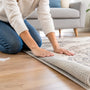 Comment éviter qu’un tapis ne roule au sol
